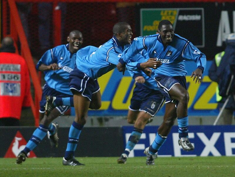 LONDON - DECEMBER 14:  Marc-Vivien Foe of Manchester City celebrates scoring their second goal during the FA Barclaycard Premiership match between Charlton Athletic and Manchester City at The Valley in London on December 14, 2002. (Photo By Ben Radford/Getty Images)