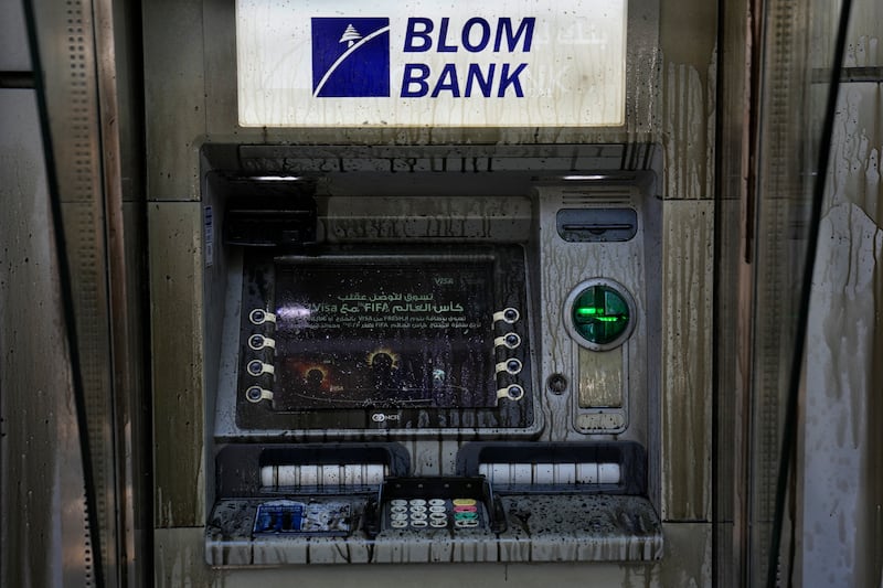 Angry depositors also poured diesel on a Blom Bank ATM. AP
