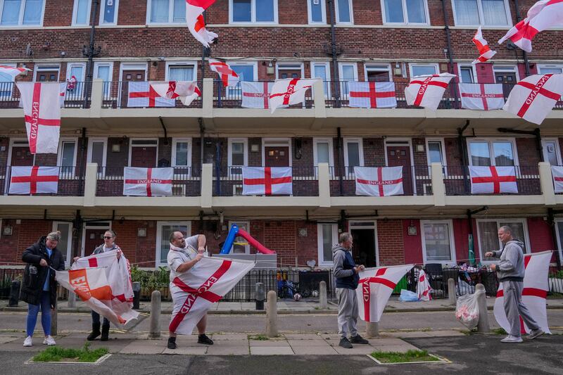England fans prepare at the Kirby estate in Bermondsey, south-east London, for the World Cup. Reuters