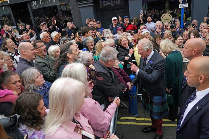 King Charles greets members of the public. PA