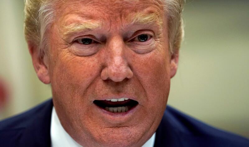 U.S. President Donald Trump speaks about healthcare during a meeting with service members at the White House in Washington, U.S., July 18, 2017.  REUTERS/Kevin Lamarque     TPX IMAGES OF THE DAY