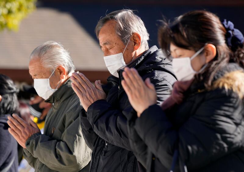Visitors pray for their health, property and a good future during their first visit of the new year at Meiji Shrine in Tokyo. EPA