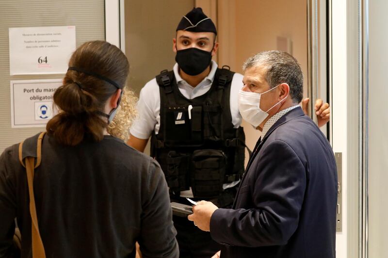 Michel Catalano, the printing house owner held hostage by the Charlie Hebdo attackers, arrives on the opening day of the trial. Reuters