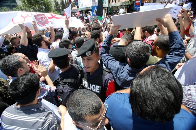 Jordanians gather at the professional Associations compound to participate at the country's strike refusing the new incom law draft put by the government and sent to the parliament, in Amman, Jordan, on May 30, 2018. (Salah Malkawi for The National)