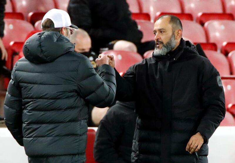 Jurgen Klopp with Wolves manager Nuno Espirito Santo after the final whistle. PA