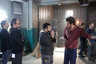 Ben Ross, producer Rami Yasin, Emirati filmmaker Majid Al Ansari and actor Ali Suliman on the set of 'Zinzana'. Courtesy Image Nation