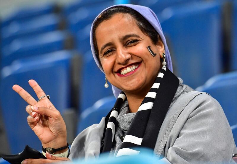 A supporter of Juventus gestures ahead of the Supercoppa Italiana final. AFP