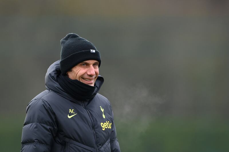 Tottenham manager Antonio Conte smiles during a training session at Tottenham Hotspur Training Centre on March 07, 2023 in Enfield, England ahead of their Champions League last-16 second leg against AC Milan. Getty Images