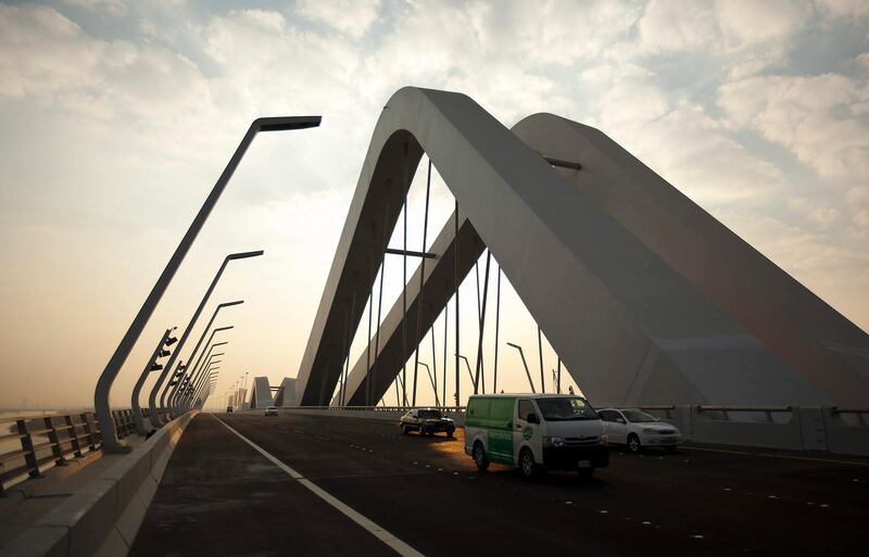 November 28, 2010 - Abu Dhabi, UAE -   Motorists drive across Sheikh Zayed Bridge on Sunday November 28, 2010.  The Sheikh Zayed Bridge in Abu Dhabi is now officially open.  The 842-metre construction, opened by Sheikh Khalifa last night, is the fourth bridge to link Abu Dhabi to the mainland.    (Andrew Henderson/The National)