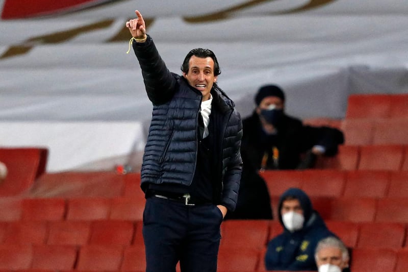(FILES) In this file photo taken on May 06, 2021 Villarreal's Spanish coach Unai Emery gestures on the touchline during the UEFA Europa League semi-final, 2nd leg football match between Arsenal and Villarreal at the Emirates Stadium in London. Unai Emery will add to his already sparkling Europa League record if Villarreal beat Manchester United on May 26, 2021 but victory would also turn an otherwise mediocre first season in charge into a great one.  / AFP / Adrian DENNIS
