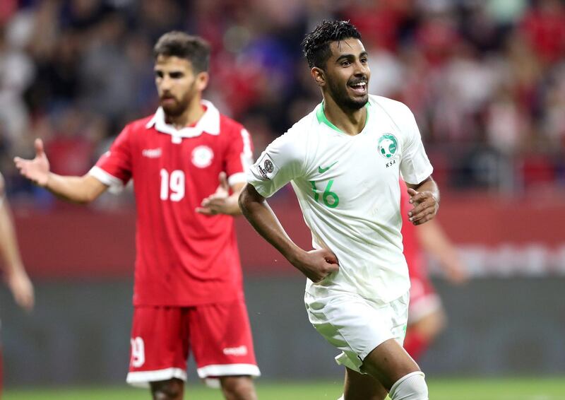 Saudi Arabia's Hussain Al Moqahwi celebrates scoring their second goal against Lebanon in their Asian Cup Group E match. Reuters
