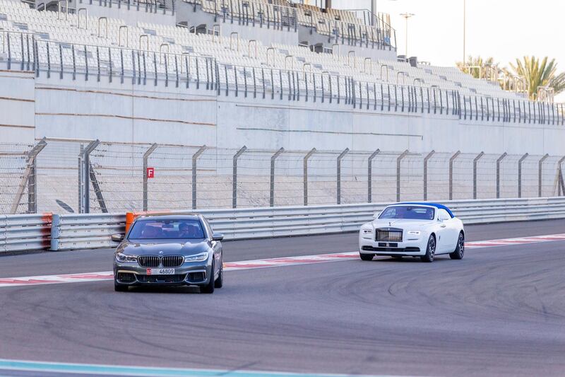 One of the pace cars takes the lead pack into the first corner. Courtesy Abu Dhabi Motors