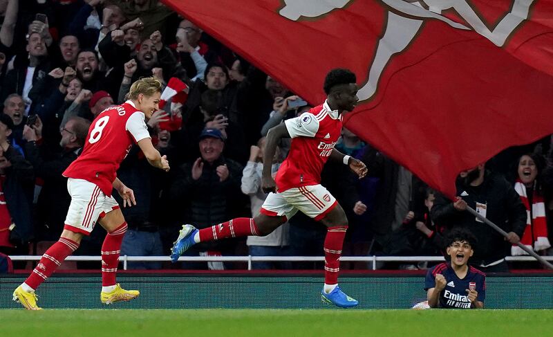 Bukayo Saka celebrates scoring Arsenal's third goal in the 3-2 Premier League victory against Liverpool at the Emirates Stadium on October 9, 2022. PA
