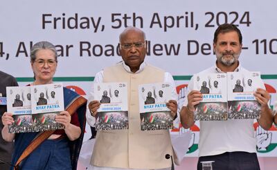 Indian National Congress leaders, from left, Sonia Gandhi, Mallikarjun Kharge and Rahul Gandhi, at the launch of their election manifesto. AP