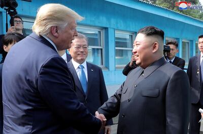 U.S. President Donald Trump shakes hands with North Korean leader Kim Jong Un as they meet at the demilitarized zone (DMZ) separating the two Koreas, in Panmunjom, South Korea, June 30, 2019. KCNA via REUTERS    ATTENTION EDITORS - THIS IMAGE WAS PROVIDED BY A THIRD PARTY. REUTERS IS UNABLE TO INDEPENDENTLY VERIFY THIS IMAGE. NO THIRD PARTY SALES. SOUTH KOREA OUT. NO COMMERCIAL OR EDITORIAL SALES IN SOUTH KOREA.