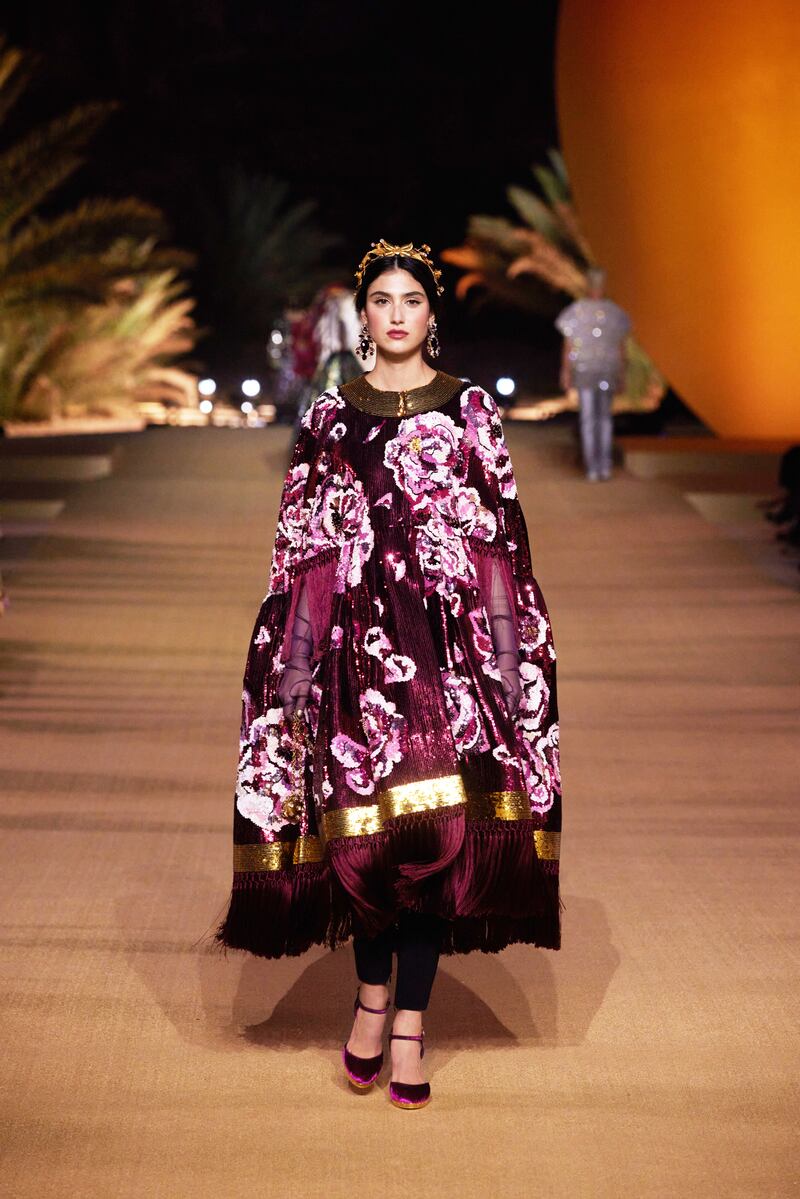 Models wore intricate gold headpieces.