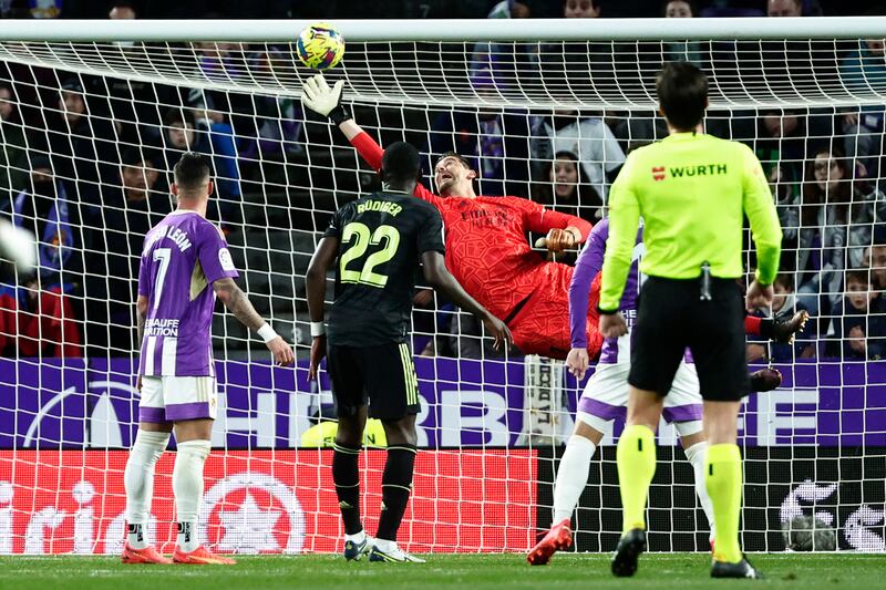 Real Madrid's goalkeeper Thibaut Courtois makes a save. AP Photo 
