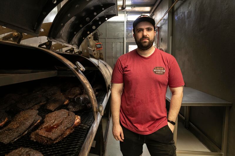 Palestinian chef and owner of Big T BBQ Kitchen, Fadel Faour shows the custom-made smoker imported from Texas. All photos: Antonie Robertson / The National