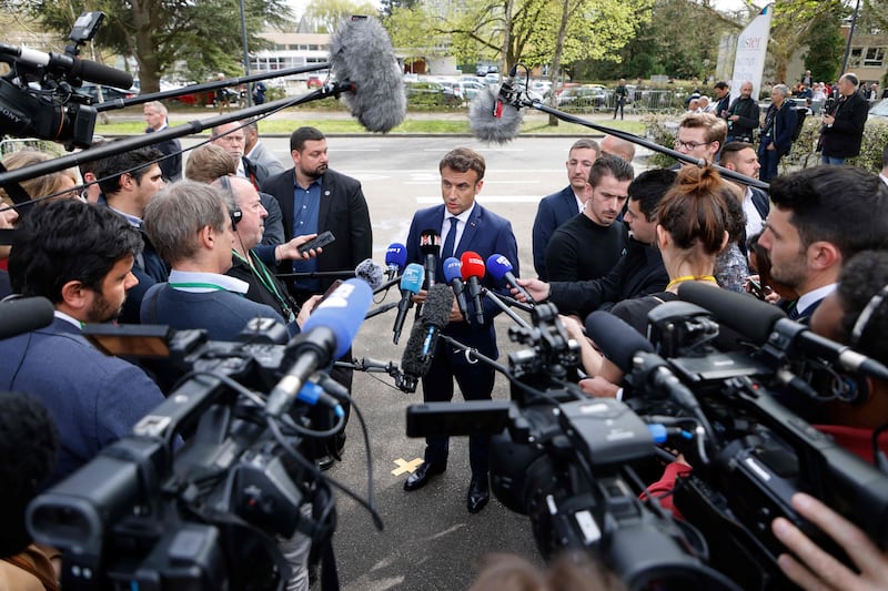 Mr Macron faces the media on a campaign visit to Grand Est, north-eastern France. AFP