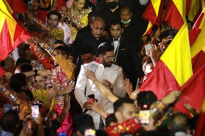 Abhishek Bachchan begins his performance as he makes his way through the crowd