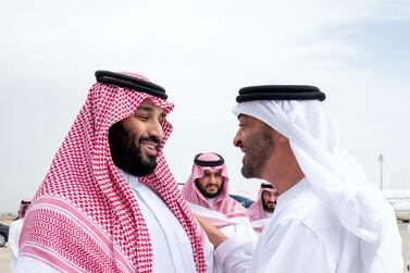 JEDDAH, SAUDI ARABIA - August 12, 2019: HH Sheikh Mohamed bin Zayed Al Nahyan, Crown Prince of Abu Dhabi and Deputy Supreme Commander of the UAE Armed Forces (R) bids farewell to with HRH Prince Mohamed bin Salman bin Abdulaziz, Crown Prince, Deputy Prime Minister and Minister of Defence of Saudi Arabia (L), at King Abdulaziz International Airport. ( Mohammed Al Hammadi / Ministry of Presidential Affairs ) ---