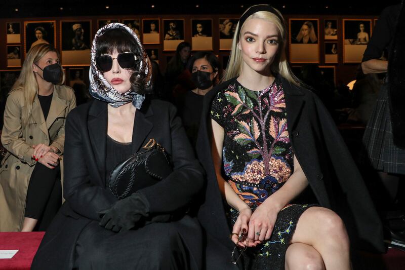 Isabelle Adjani and Anya Taylor-Joy attend the Dior autumn/winter 2022-2023 show as part of Paris Fashion Week on March 1, 2022. AP Photo