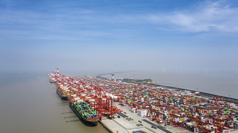 Gantry cranes and containers at the Yangshan Deepwater Port in Shanghai, China. Bloomberg