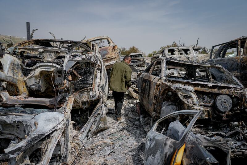 Cars in this scrapyard were torched in Hawara in the West Bank. AP