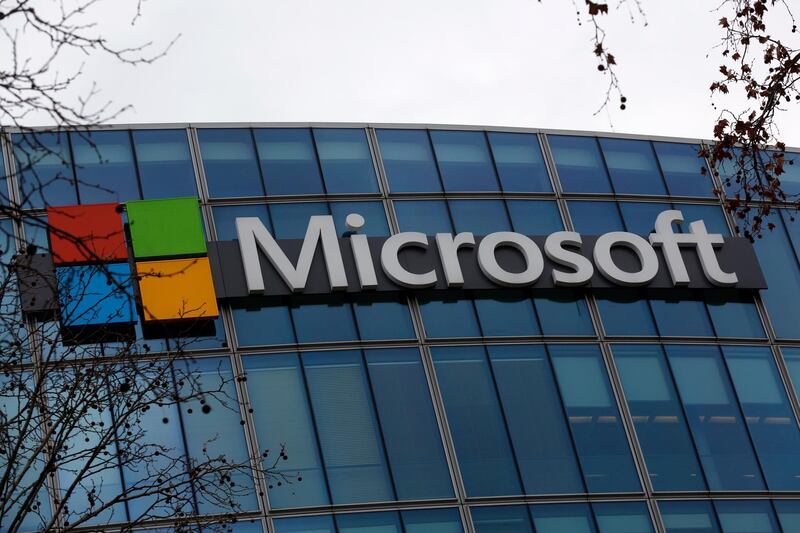 FILE - This Jan. 8, 2021 file photo shows the logo of Microsoft displayed outside the headquarters in Paris. Microsoftâ€™s business beat Wall Street expectations for the first three months of 2021, thanks to ongoing demand for its software and cloud computing services during the pandemic. The company on Tuesday, April 27, 2021 reported fiscal third-quarter profit of $14.8 billion, up 38% from the same period last year. (AP Photo/Thibault Camus, file)