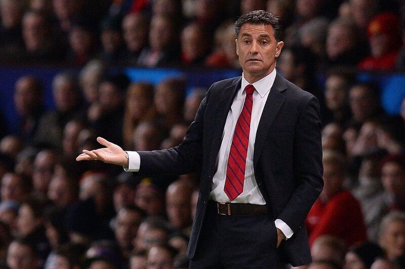 Olympiakos' Spanish manager Michel reacts during his side's loss to Manchester United at Old Trafford on Wednesday. Andrew Yates / AFP / March 19, 2014