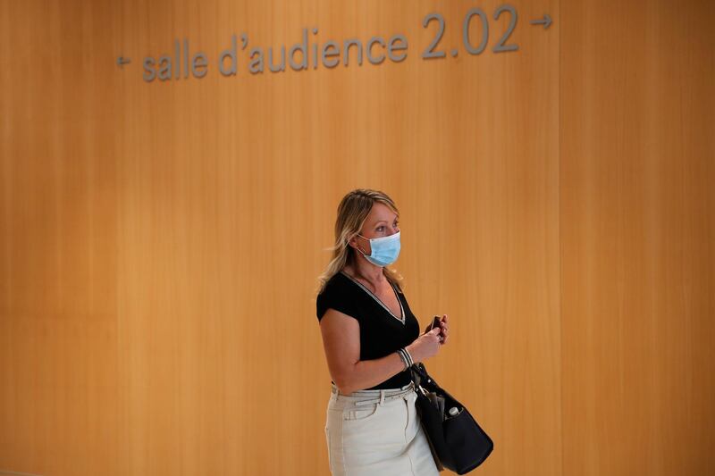 Gala Renaud, widow of Michel Renaud who was killed in Charlie Hebdo office, arrives at the courtroom on the opening day of the 2015 attacks trial. AP Photo