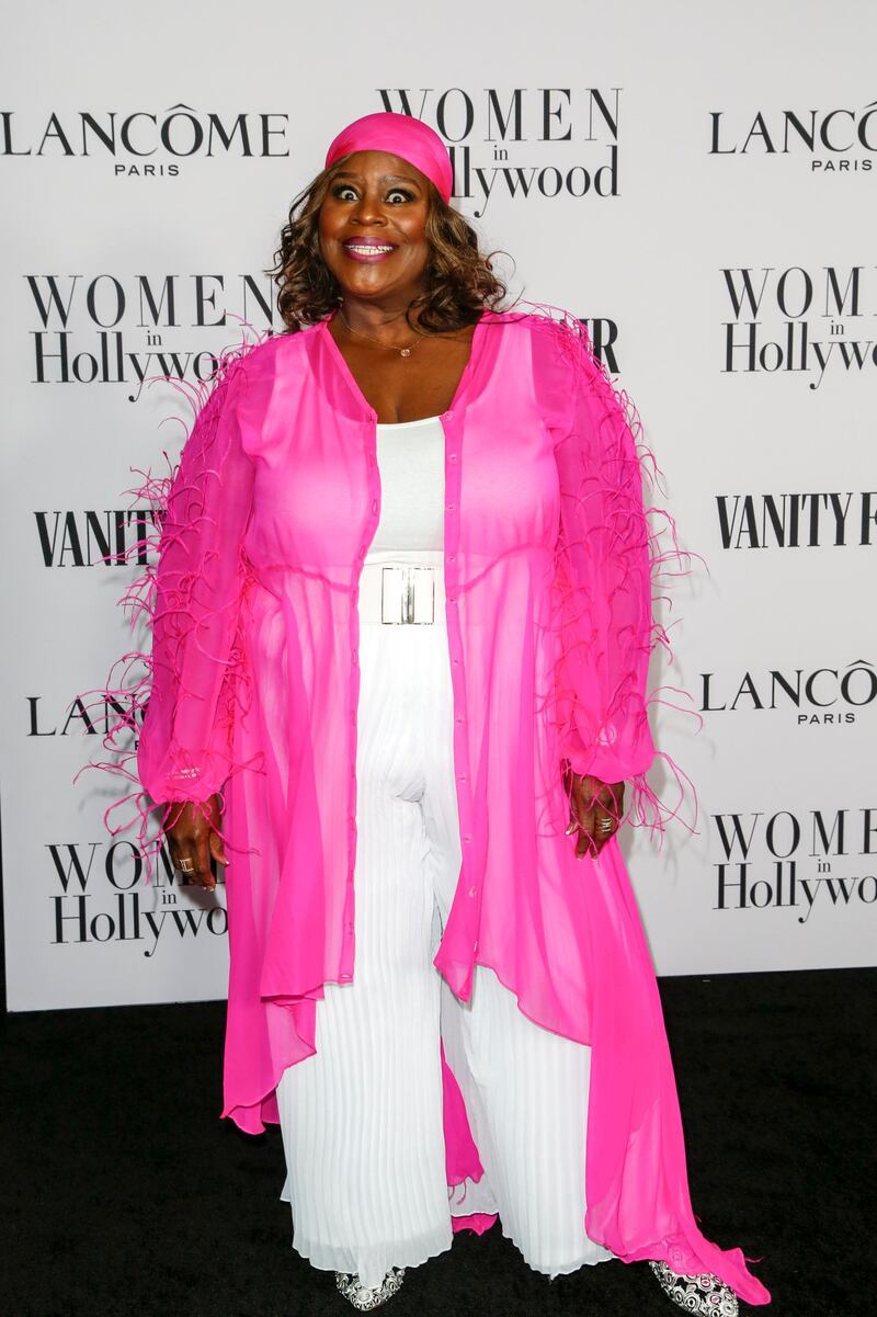 Retta in a hot pink jacket, which she revealed was a last minute decision after she discovered the jacket she was planning on wearing was ripped. At the Vanity Fair and Lancome Women In Hollywood Celebration at the Soho House in Hollywood. EPA