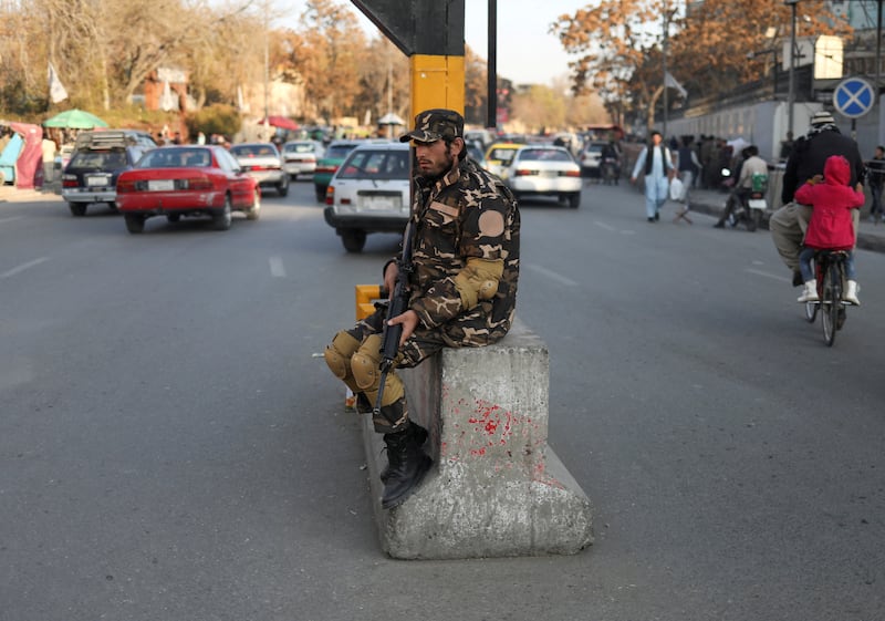 A Taliban fighter guards a street in Kabul, Afghanistan. Reuters