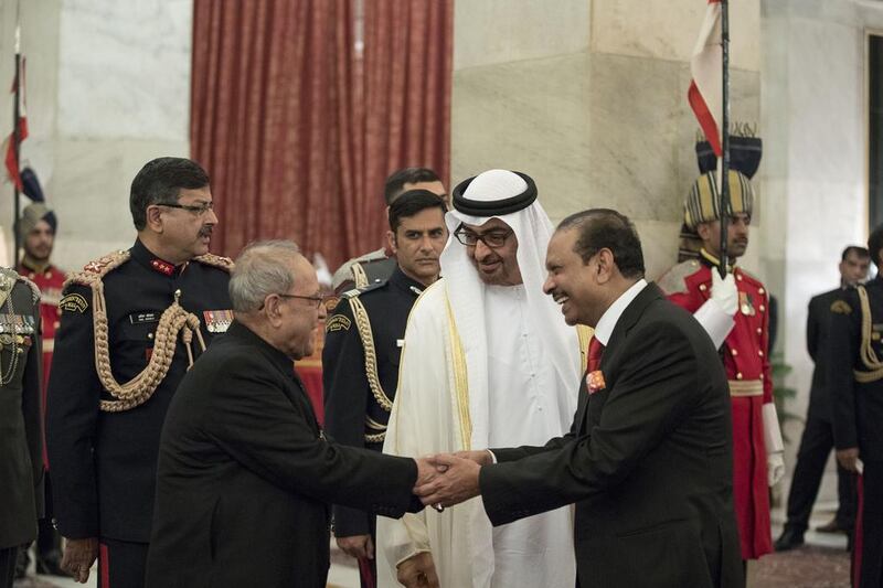 Sheikh Mohammed bin Zayed, Yusuff Ali, Managing Director Emke Group, right, and Pranab Mukherjee, President of India, at a dinner reception at Rashtrapati Bhavan. Mohamed Al Hammadi / Crown Prince Court - Abu Dhabi