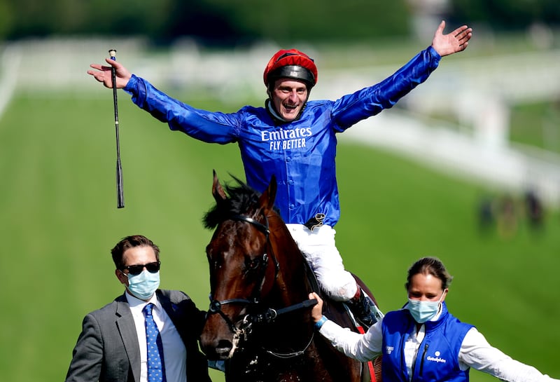Adam Kirby celebrates on top of Adayar after winning the Cazoo Derby during day two of the Cazoo Derby Festival at Epsom Racecourse. Picture date: Saturday June 5, 2021.