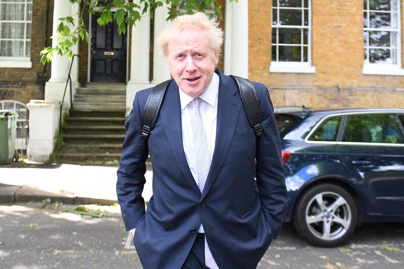 (FILES) In this file photo taken on May 28, 2019 Conservative MP Boris Johnson leaves his residence in south London. Boris Johnson, the front-runner to become Britain's next prime minister, must attend court over allegations that he knowingly lied during the Brexit referendum, a judge announced Wednesday, May 29. / AFP / Daniel LEAL-OLIVAS

