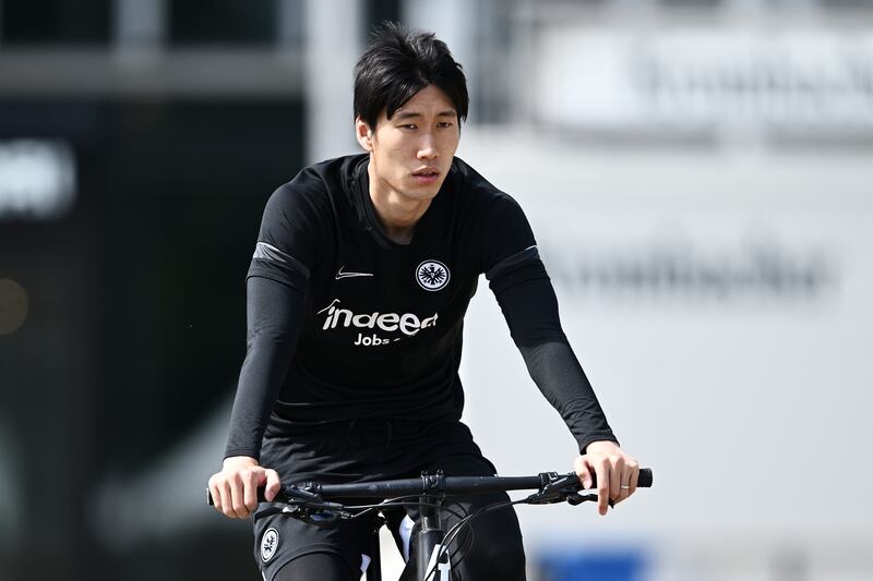 Daichi Kamada of Eintracht Frankfurt arrives for training on Tuesday. Getty
