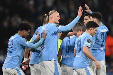 Manchester City's Norwegian striker #09 Erling Haaland (C) celebrates with teammates after scoring their third goal during the UEFA Champions League round of 16, second-leg, football match between Manchester City and FC Copenhagen at the Etihad Stadium, in Manchester, north west England, on March 6, 2024.  (Photo by Paul ELLIS  /  AFP)