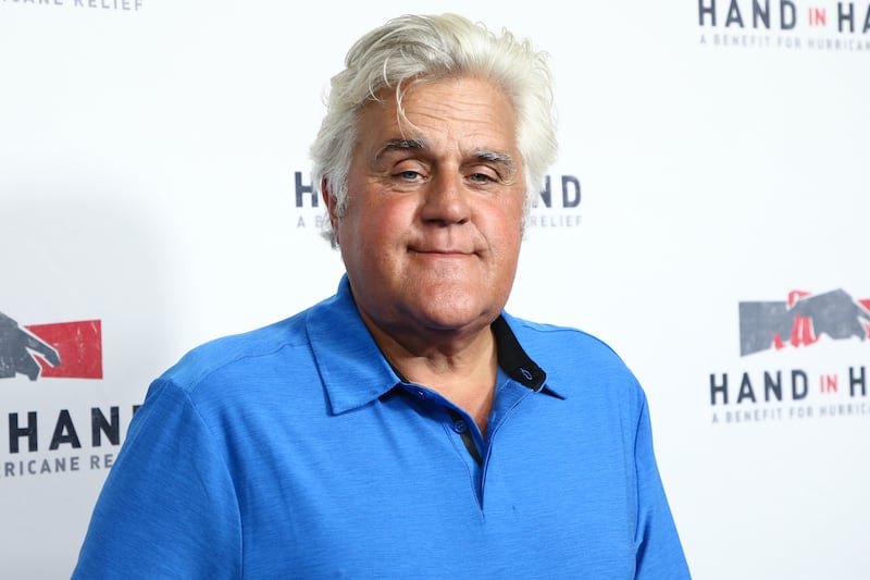 FILE - Jay Leno attends the Hand in Hand: A Benefit for Hurricane Harvey Relief in Los Angeles on Sept.  12, 2017.  Jay Leno suffered burns in a weekend fire at the car enthusiast's garage but said Monday that he was doing OK, according to reports.  Leno, 72, had been set to appear at a financial conference in Las Vegas on Sunday but canceled because of a “serious medical emergency. " (Photo by John Salangsang / Invision / AP, File)
