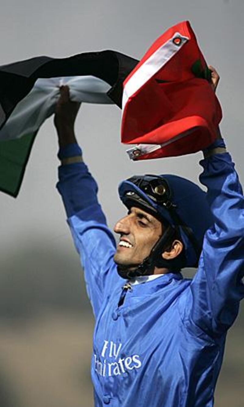 Ahmed Ajtebi celebrates after guiding Vale of York to victory at the Breeders' Cup in California.