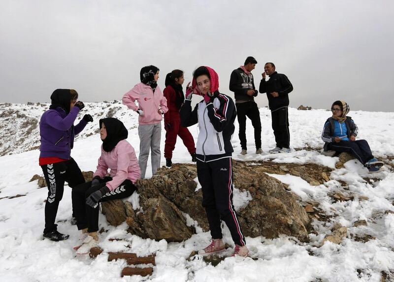 Members of Afghanistan’s women’s national cycling team during an exercise on a snowy mountain in Qargha, about 10 kilometres west of the capital. Women’s rights have made gains since the Taliban was ousted from power in 2001, but they are still underrepresented in politics.