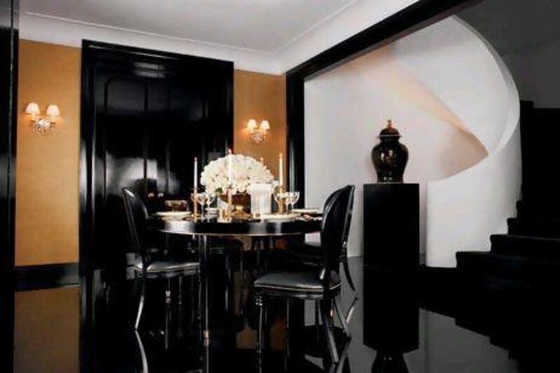 The sleek black and gold One Fifth collection from Ralph Lauren Home has clear art deco influence. Courtesy of Vertis Communications