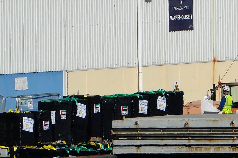 Pallets of food aid from the US charity World Central Kitchen and the UAE are loaded on to a vessel preparing to depart for Gaza from Larnaca, Cyprus. AP