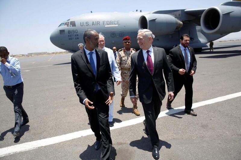 US defence secretary James Mattis is greeted by Djibouti's Minister of Defense Ali Hasan Bahdon as he arrives at Djibouti-Ambouli International Airport in Ambouli, Djibouti April 23, 2017. REUTERS/Jonathan Ernst