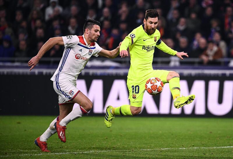 Barcelona's Lionel Messi controls the ball next to Lyon's Leo Dubois. AFP