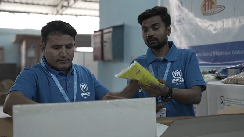 UN workers in India receive food parcels paid for by the campaign.