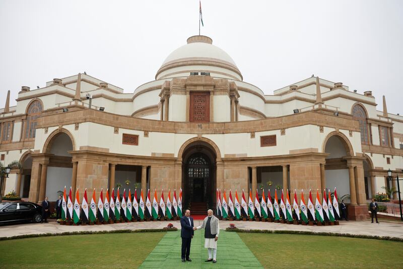 The leaders pose in front of Hyderabad House, the state guest house of India's Prime Minister. Reuters