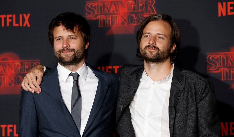 Stranger Things creators Ross, left, and Matt Duffer have announced the show's final season has been postponed due to the writers strike. Reuters