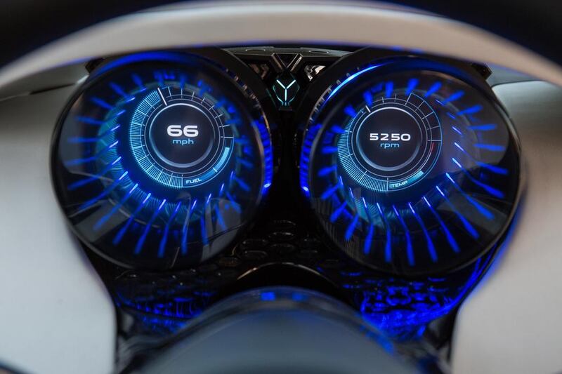The car has blue neon lighting on the dashboard and the centre console. Courtesy Jaguar