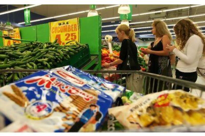 People buying vegetables and grocery items at the Lulu hypermarket in Al Barsha in Dubai.